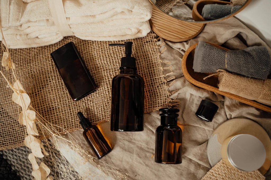 Morning skincare routine with hyaluronic acid and niacinamide serums, moisturizer, and sunscreen